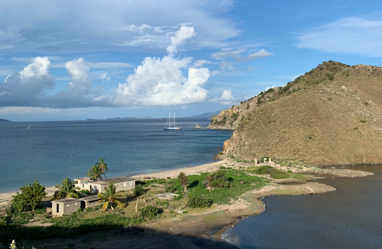 the wreck of the Rhone lays, with the Cuan Law anchored in the distance from above for viewers.